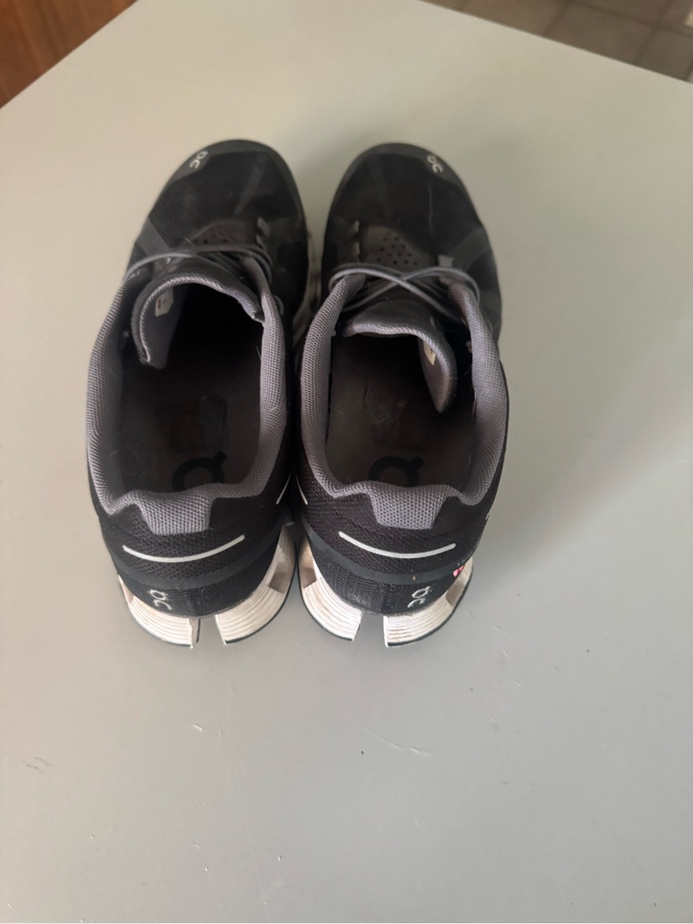 On Running Women’s Black and Gray Cloud-Style Sneakers